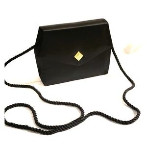 Womens small black clutch/purse. Gently used